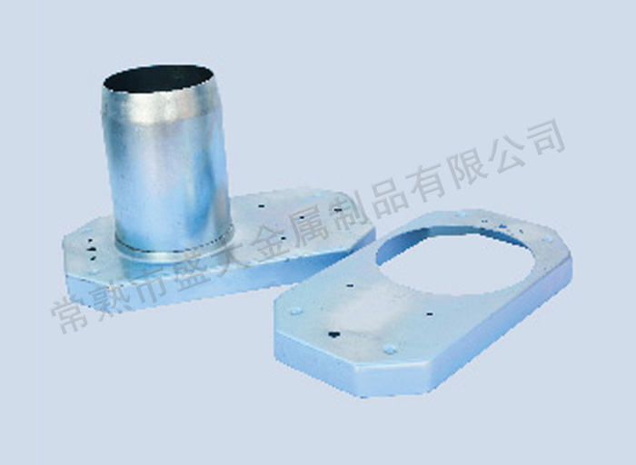 Refractory material protective shell