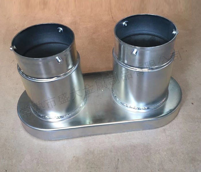 Refractory material protective shell