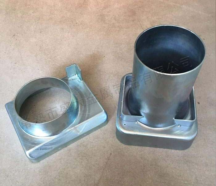 Refractory material protective shell